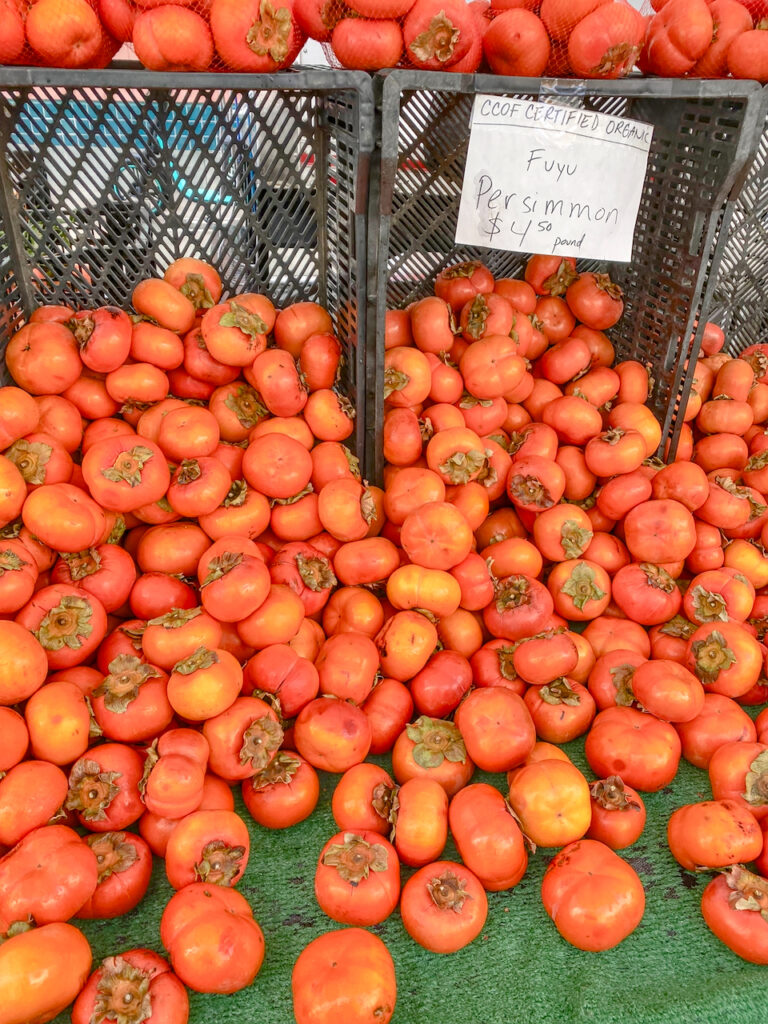 fuyu persimmons at the farmers market