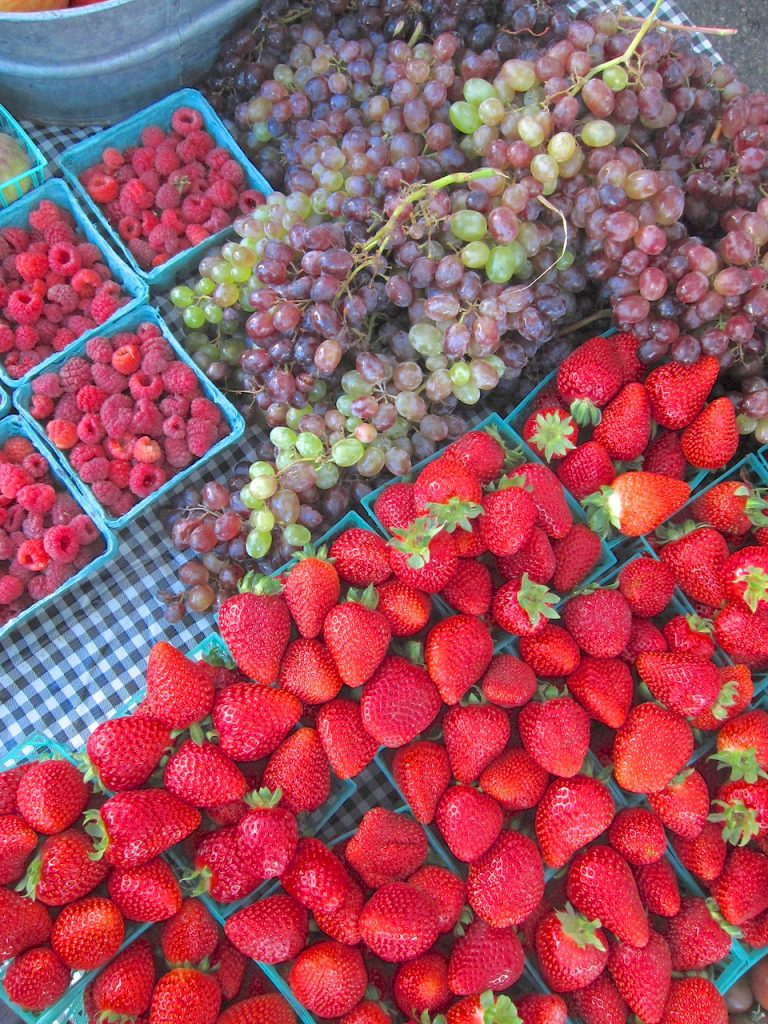 grapes and strawberries at the farmers market