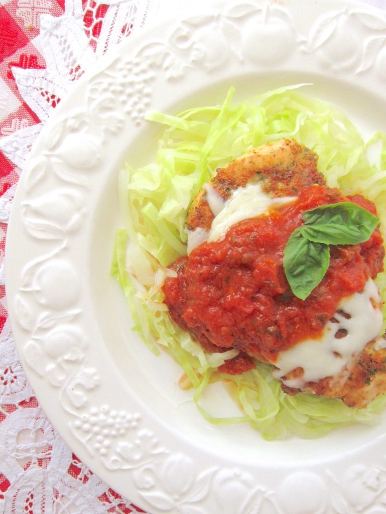Chicken Parmigiana on cabbage