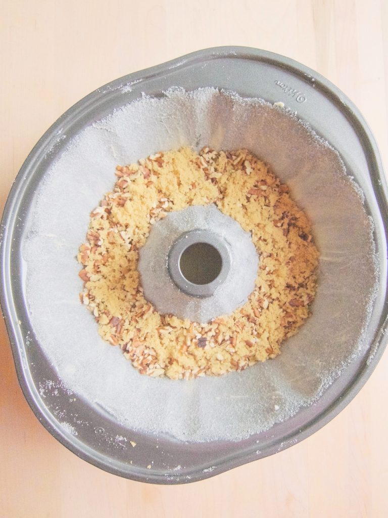 prepared bundt pan with topping
