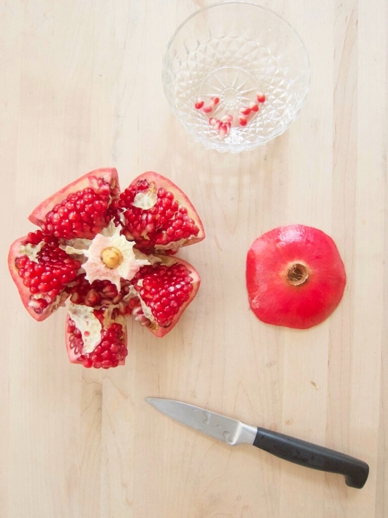 cutting the pomegranate