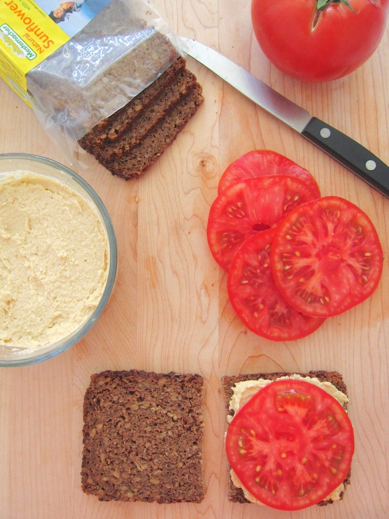 hummus on pumpernickel bread