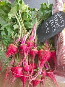 candy striped beets at the farmers market