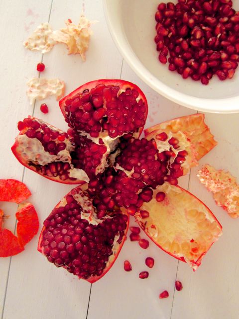 cutting a pomegranate open
