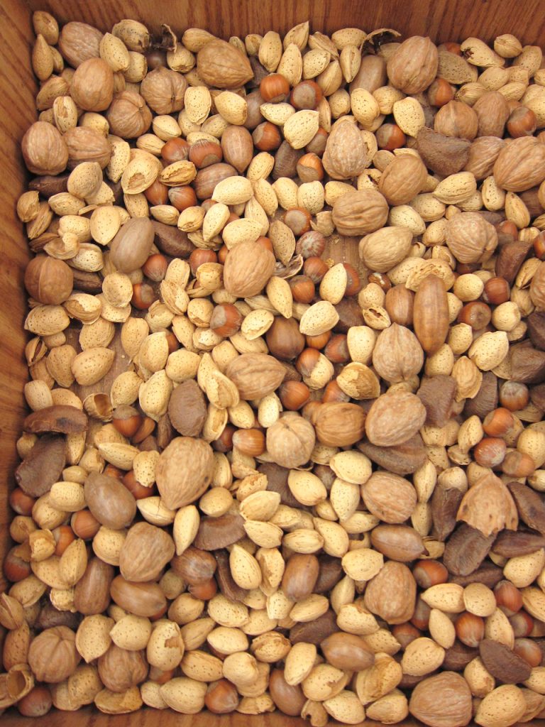 unshelled almonds with other nuts at the farmers market