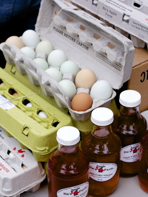 carton of eggs next to apple vinegar