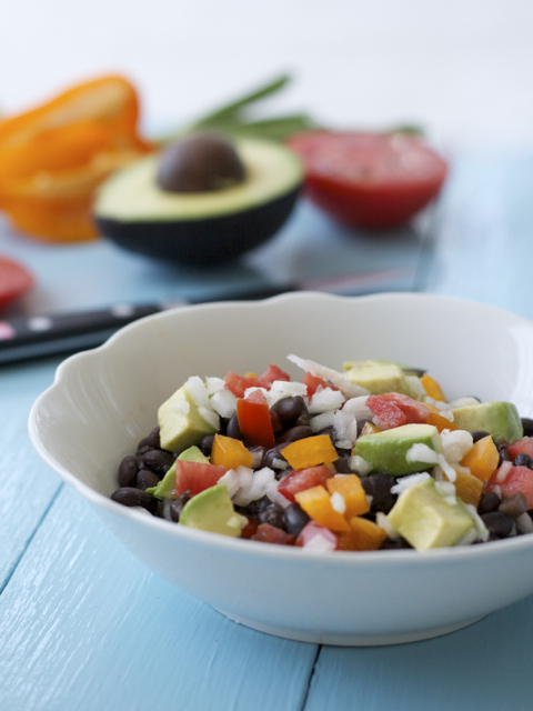 black beans topped with fresh tomato, onions, peppers and avocado