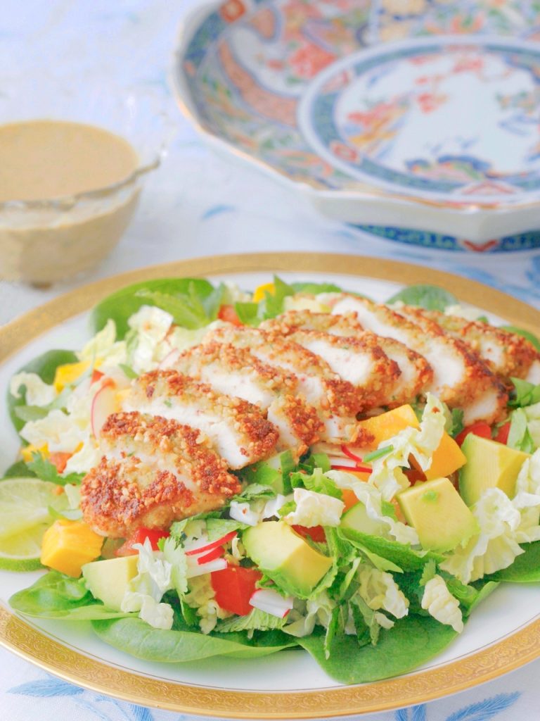 a serving of Copycat Houston's Thai Salad With Peanut Crusted Chicken