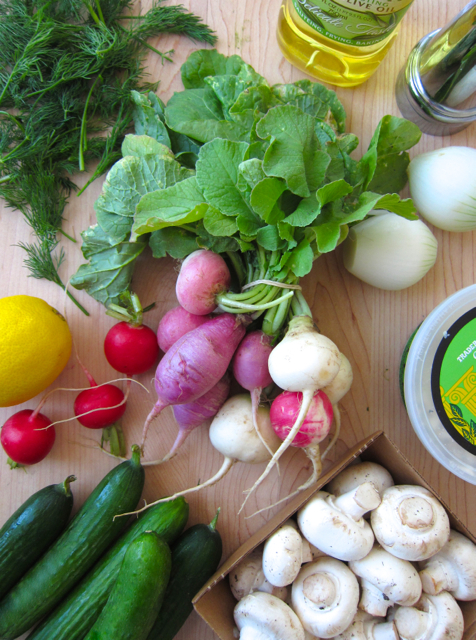 Radishes, cucumbers, mushrooms, dill, and lemons