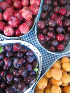plums at the farmers market