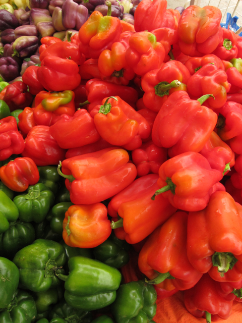 red bell peppers at farmers market