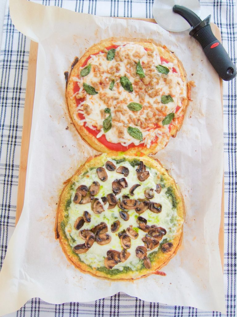2 cauliflower crust pizzas