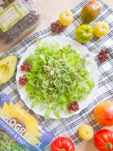 preparing Chicken Salad With Lime, Microgreens and Grapes