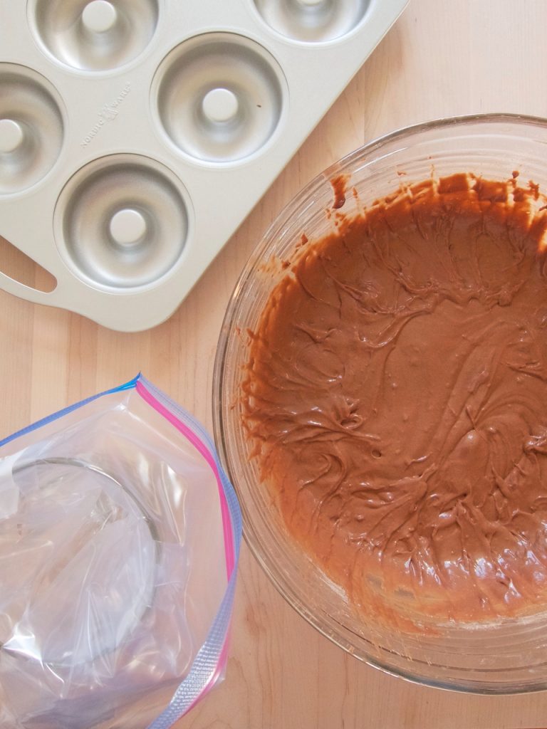preparing chocolate donuts