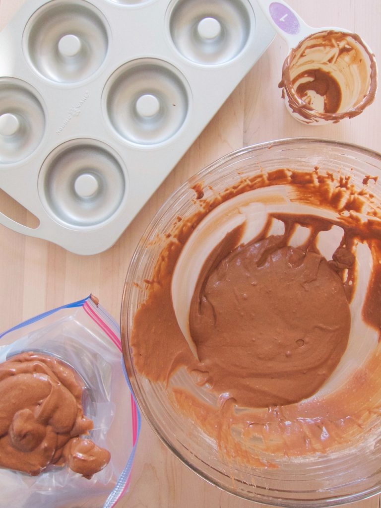 preparing chocolate donuts