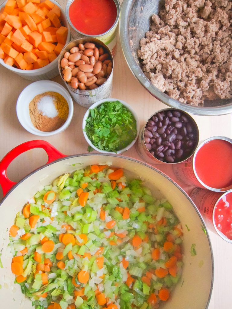 preparing lamb curry chili