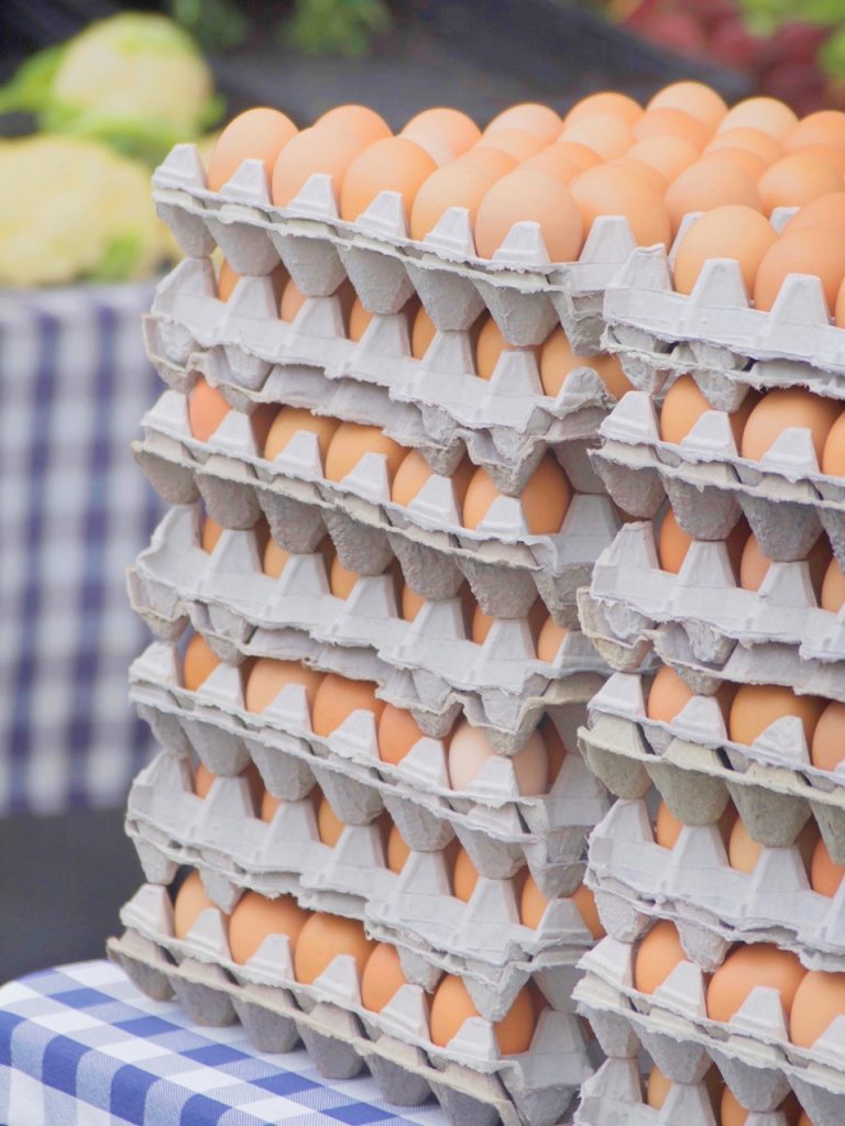 stacks of eggs at the farmers market