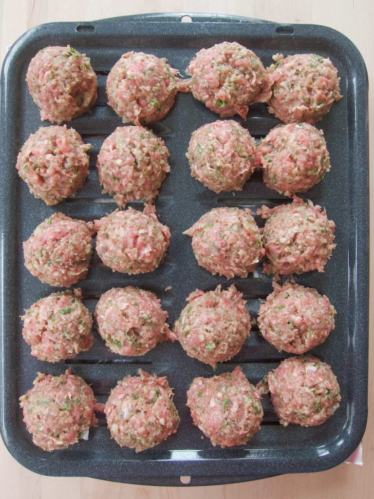 uncooked Greek meatballs