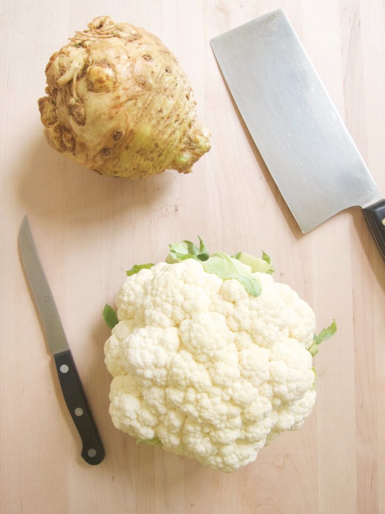 a head of cauliflower and a celery root